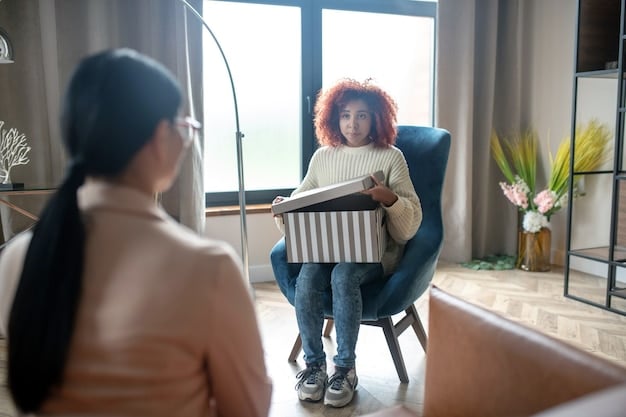A person in a therapy session, sitting across from a therapist who is taking notes. The setting should be a comfortable and professional office environment.