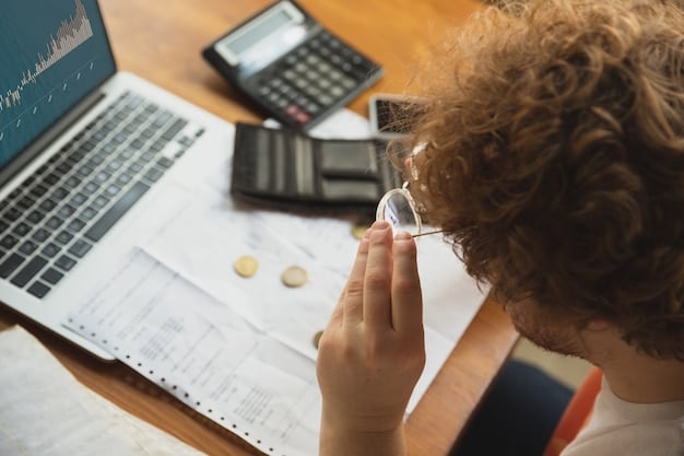 A person calculating savings on a laptop with a savings calculator, using a calculator, HSA graphs and charts in the background to represent tax-advantaged healthcare savings.