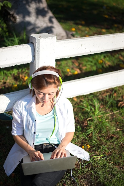 A doctor using telemedicine to consult with a patient from a rural area. The scene should highlight the use of technology to improve access to healthcare.