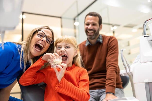 A family happily visiting a dentist's office, illustrating the importance of regular dental check-ups covered by affordable insurance plans. The scene is warm and inviting, emphasizing preventative care.
