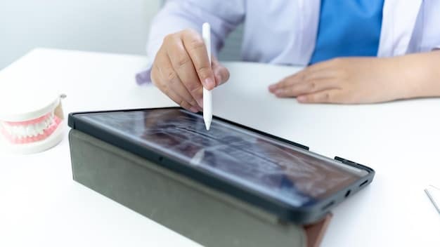 A close-up of different types of dental plans being compared side-by-side on a tablet screen, highlighting the features and costs of each.