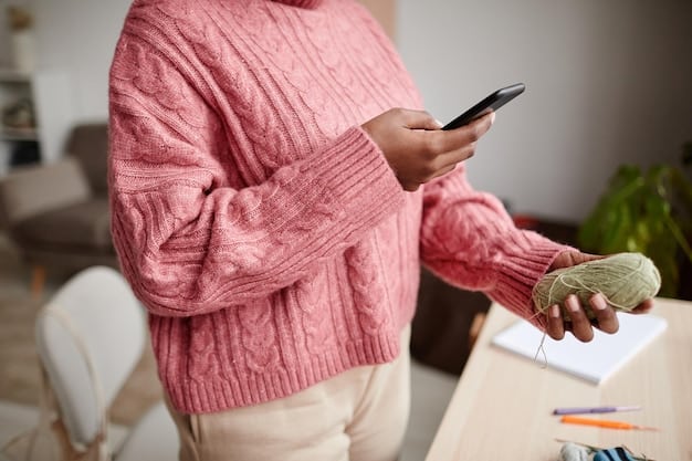 A person holding a smartphone showing a banking app with a view of their savings account balance increasing. The background is a cozy living room, symbolizing personal finance and savings goals.