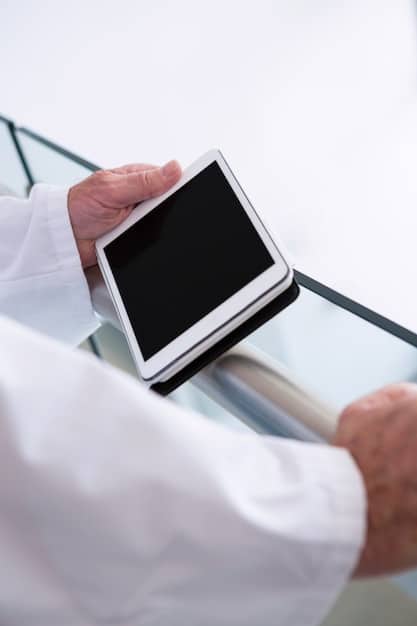 A hand holding a smartphone, scanning a medical bill at a doctor's office. The screen displays the scanned image, ready to be saved in a digital filing system.