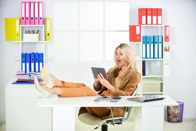 A person sitting at a desk, reviewing different health insurance plan documents. The background is a bright and organized office space.
