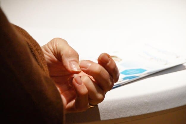 A close-up of a hand pointing to a specific line on a tax form, highlighting potential HSA contributions or distributions needing careful review.
