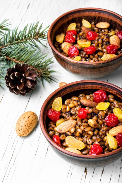 A vibrant, close-up shot of various dried legumes—red lentils, black beans, chickpeas, and kidney beans—arranged artfully in separate wooden bowls on a rustic kitchen counter, emphasizing their natural texture and color.