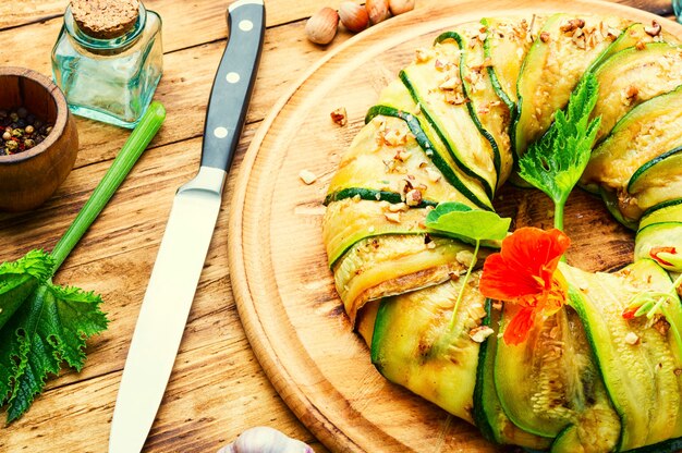 A close-up shot of freshly baked zucchini bread slices on a wooden cutting board, with visible specks of green zucchini, steam subtly rising, indicating warmth and freshness.