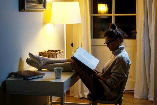 A person sitting comfortably, reading a book, while a sleek, modern light therapy lamp is placed on a table nearby, emitting a gentle, warm glow. The scene conveys relaxation and well-being.