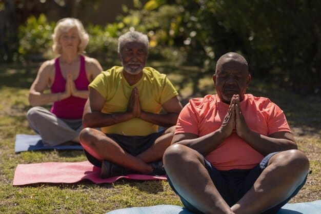 A diverse group of people of different ages meditating together in a bright, modern setting, symbolizing general well-being and accessibility.