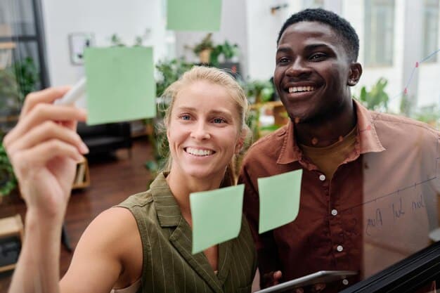 Colleagues gathered in a bright, modern office holding cards with positive mental health affirmations and smiling, fostering a supportive atmosphere.