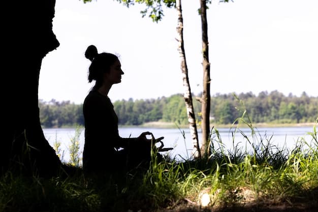 A serene person meditating in a peaceful natural setting, embodying mindfulness and calm, with a blurred background suggesting mental clarity and focus.