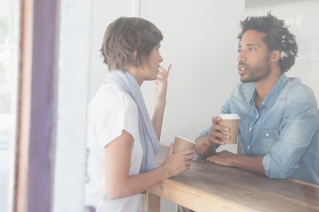 Two people having a serious but supportive conversation over coffee, one actively listening to the other, symbolizing the importance of seeking and receiving feedback from external sources.