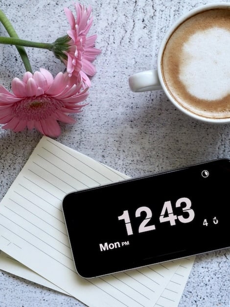 A digital interface showing a calendar app with a highlighted 5-minute breathing session reminder. The background is blurred and features calming colors to emphasize relaxation. This image visually supports integrating the