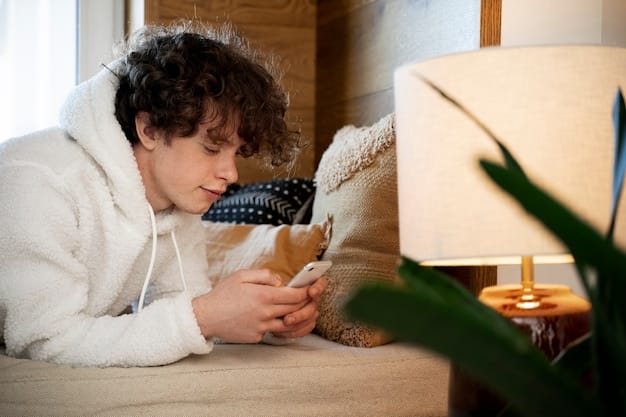 A teenager using a mindfulness app on their phone while sitting comfortably in a quiet, sunlit room. The image emphasizes the accessibility and convenience of mindfulness tools in the digital age, highlighting how technology can support mental well-being. This relates back to recent updates: New Research Highlights the Benefits of Mindfulness for Reducing Anxiety in Teenagers, showcasing modern methods for anxiety management.