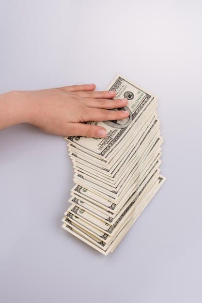 A close-up shot of a person's hand gently holding a stack of money, with a blurred background of a peaceful landscape. The image represents the harmony between financial stability and inner peace, highlighting The Financial Impact of Mindfulness: How Reducing Stress Can Improve Your Financial Decision-Making.