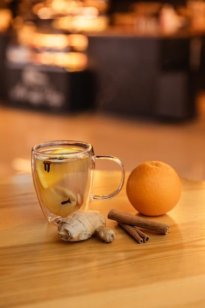 A close-up shot of a steaming mug filled with ginger tea, garnished with a lemon slice and a honey dipper resting on a saucer, placed on a rustic wooden table with a blurred background of a cozy living room.