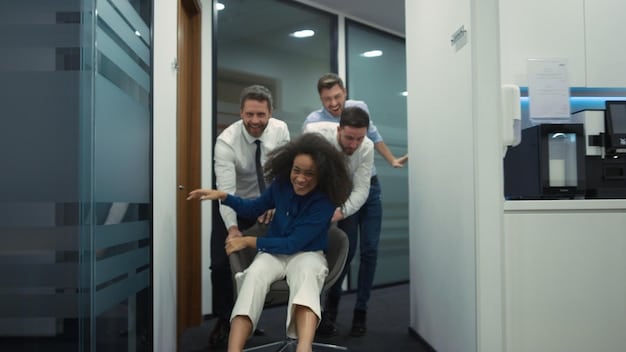 An employee leaving the office at a reasonable hour, with a smile, while other employees are still working late, symbolizing the importance of encouraging work-life balance for mental wellness at work: 5 ways to create a more supportive and positive environment in 2025.