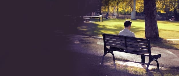 A person sitting alone on a park bench, looking downcast, with blurred figures of people interacting in the background, illustrating the contrast between isolation and social connection and highlighting The Impact of Social Isolation on Mental Health: Strategies for Staying Connected and Combating Loneliness.