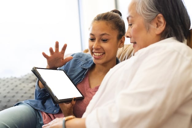 An elderly woman smiling while video chatting with her grandchildren on a tablet, illustrating how technology can bridge distances and combat social isolation, a key focus of The Impact of Social Isolation on Mental Health: Strategies for Staying Connected and Combating Loneliness.
