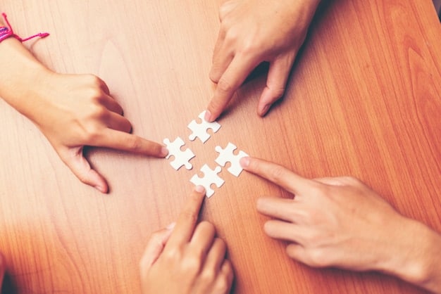 A close-up of hands fitting puzzle pieces together, symbolizing the discovery and integration of personal strengths. The background is blurred, keeping the focus on the puzzle.