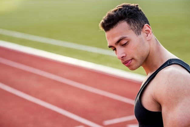 An athlete standing on a track, eyes closed, visualizing themselves winning the race. The focus is on their confident stance and the mental concentration on achieving their goal. Shows The Power of Visualization: How to Use Mental Imagery to Achieve Your Goals